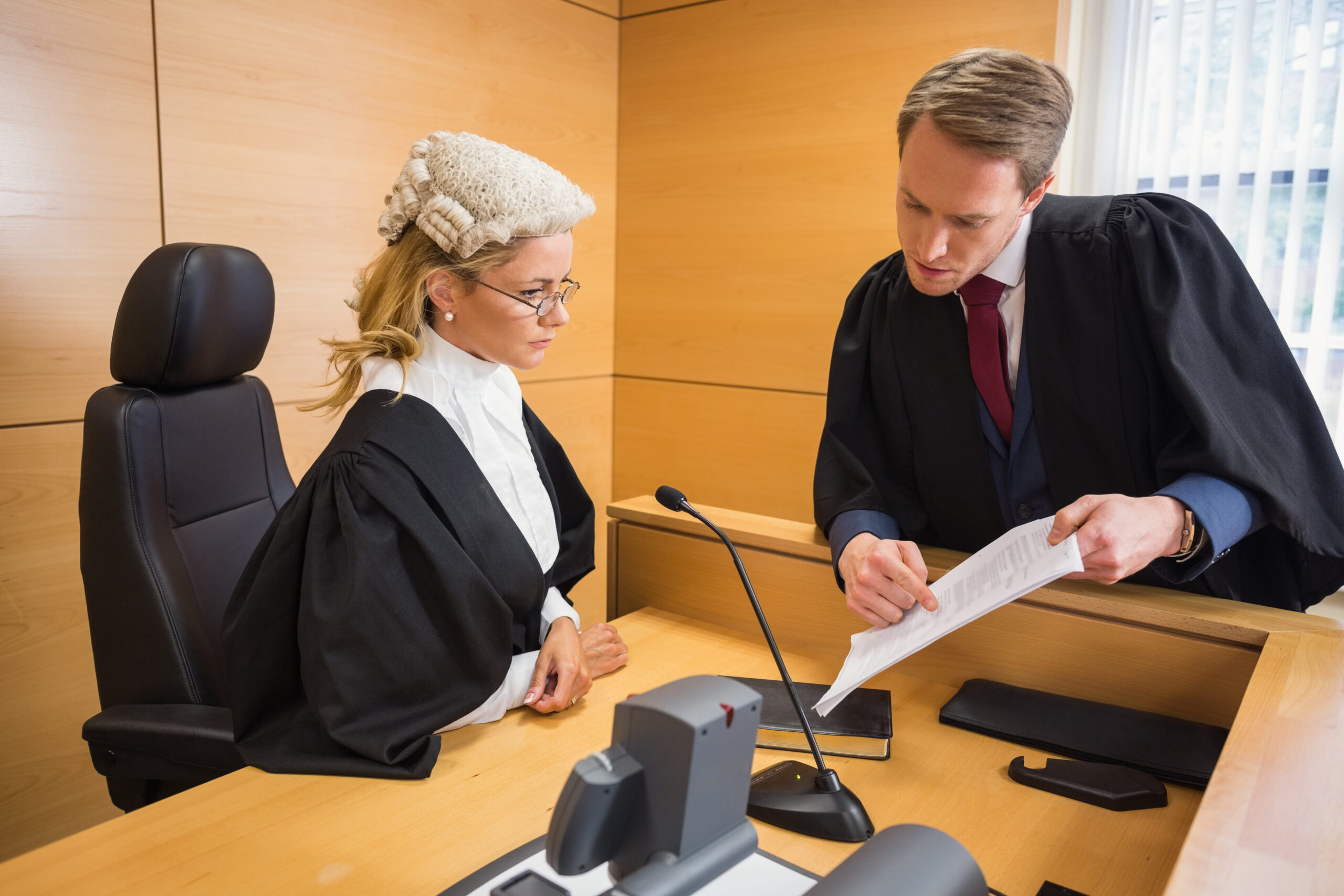 Lawyer Speaking With The Judge In The Court Room